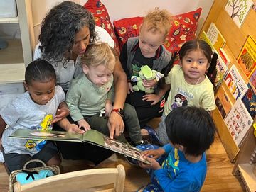 Reading as we transition in the morning in our book area.
