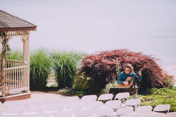 Aaron Prillaman playing classical guitar at the Rumbling Bald Resort in Lake Lure, NC.