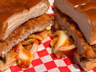 Pearl’s Shore Good Tenderloin — breaded pork tenderloin with pickles, mustard, ketchup, and onion.