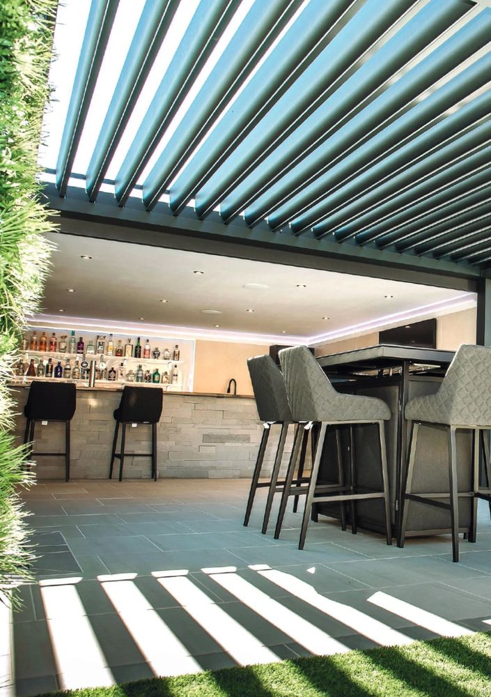 Automated louvered pergola creating a perfect setting for Outdoor entertainment.