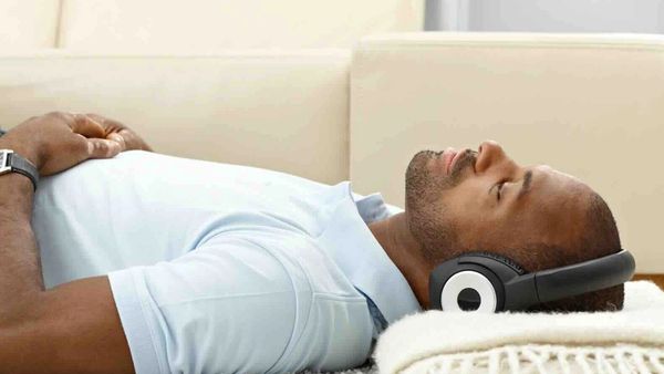 Man relaxing during a ketamine assisted therapy session