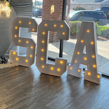 Light up marquee letters for cheer banquet.