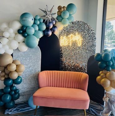 "Something Blue Before I Do" theme in blues for a bridal shower - showing backdrop area with couch.