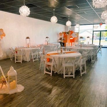 View from the back of the venue showing decorated event space.