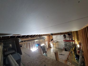 After hanging drywall