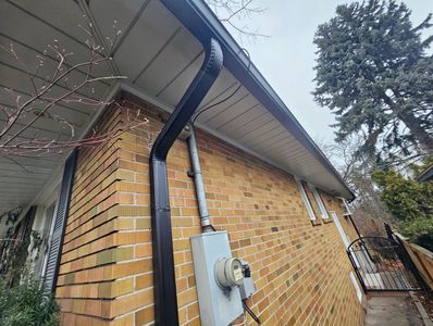 Seamless aluminum eavestrough installation on a residential home in Toronto