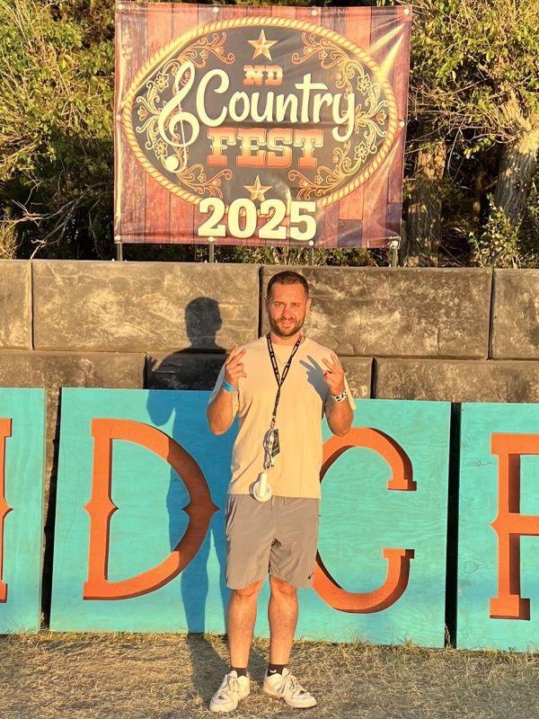Man posing at ND Country Fest 2025.