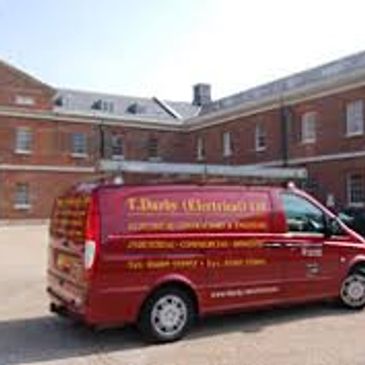 A van in front of an establishment