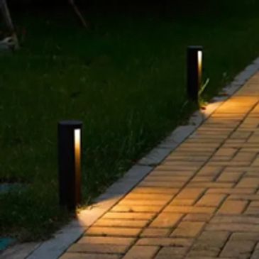 Street lamps along the pavement