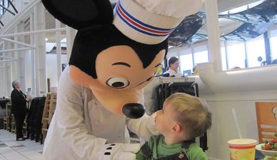 Disney Character Dining Theme Park Nannies Chef Mickey's Nanny childcare babysitting mouse hand baby