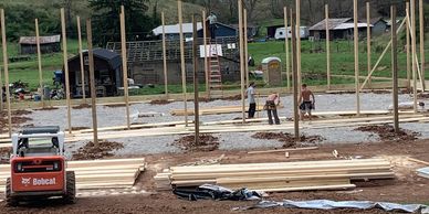 Agriculture post frame pole barn structure being built