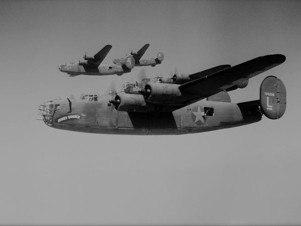 World War II B-24 bomber representing the dangers faced by American diplomats in wartime China