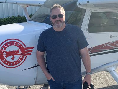 Sean Clayton, DUI Lawyer, in front of a Cessna.