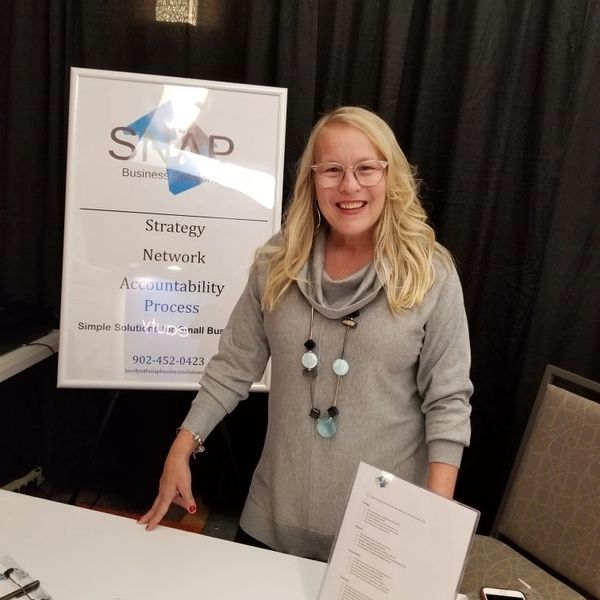 Business consultant promoting company at a trade show