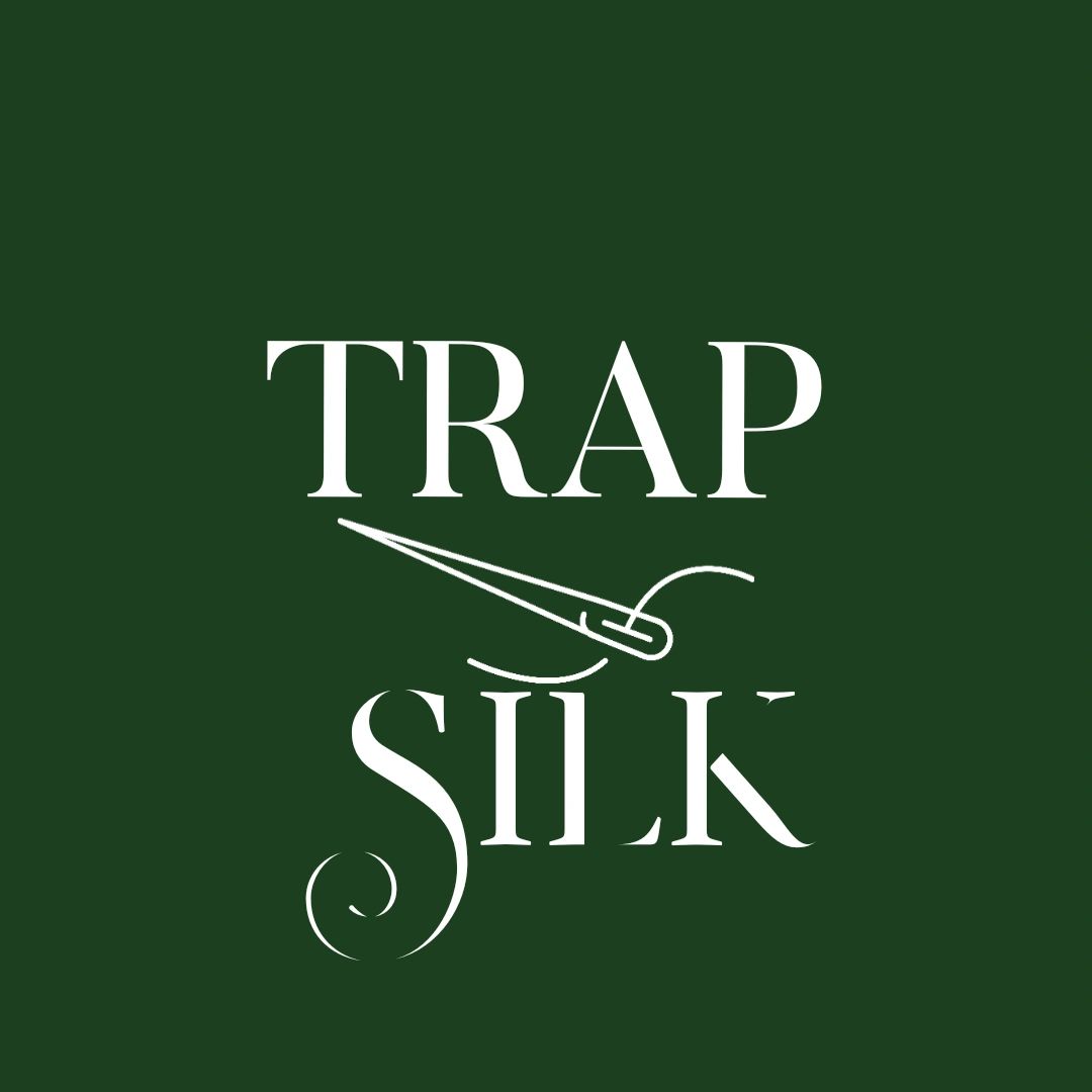 Logo with text 'TRAP SILK' and sewing needle graphic on dark green background.