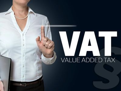 vat touchscreen is operated by businesswoman.
