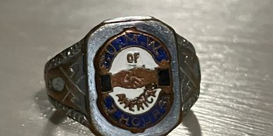 This belonged to my Great Great Grandpa, Mitchell Woody, of WV. The ring commemorates a strike.
