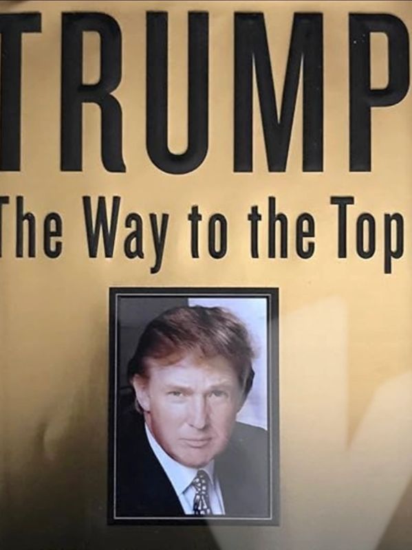 Smiling Fascist on the cover of a horrible, uninspiring, unintelligent, garbage book.