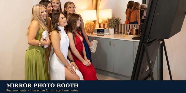 Guests enjoying the Shoreline Events interactive Mirror Photo Booth at an Event in Perth.