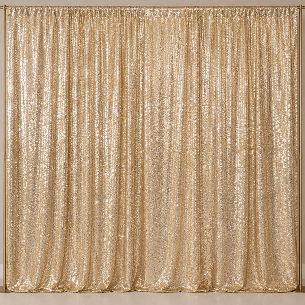 Gold sequin curtain hanging on a rod.