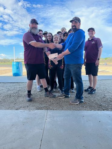 Idaho Sportsman's Alliance Donating a check to the Nampa Christian Shooting Team.