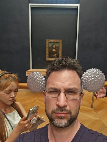 Ears for EPCOT in front of The Mona Lisa