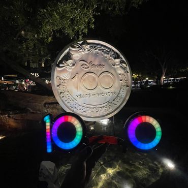 100 Year Ears Next To Disney Medallion