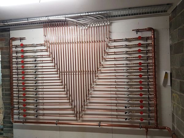 Subcontract works to company for Plumbing Commercial water main installation to block of flats.