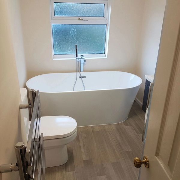 Bathroom Renovation, free standing bath, Lvt flooring, toilet & towel rail