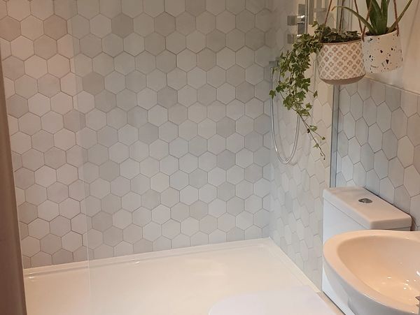 Hexagonal tile pattern modern bathroom renovation
