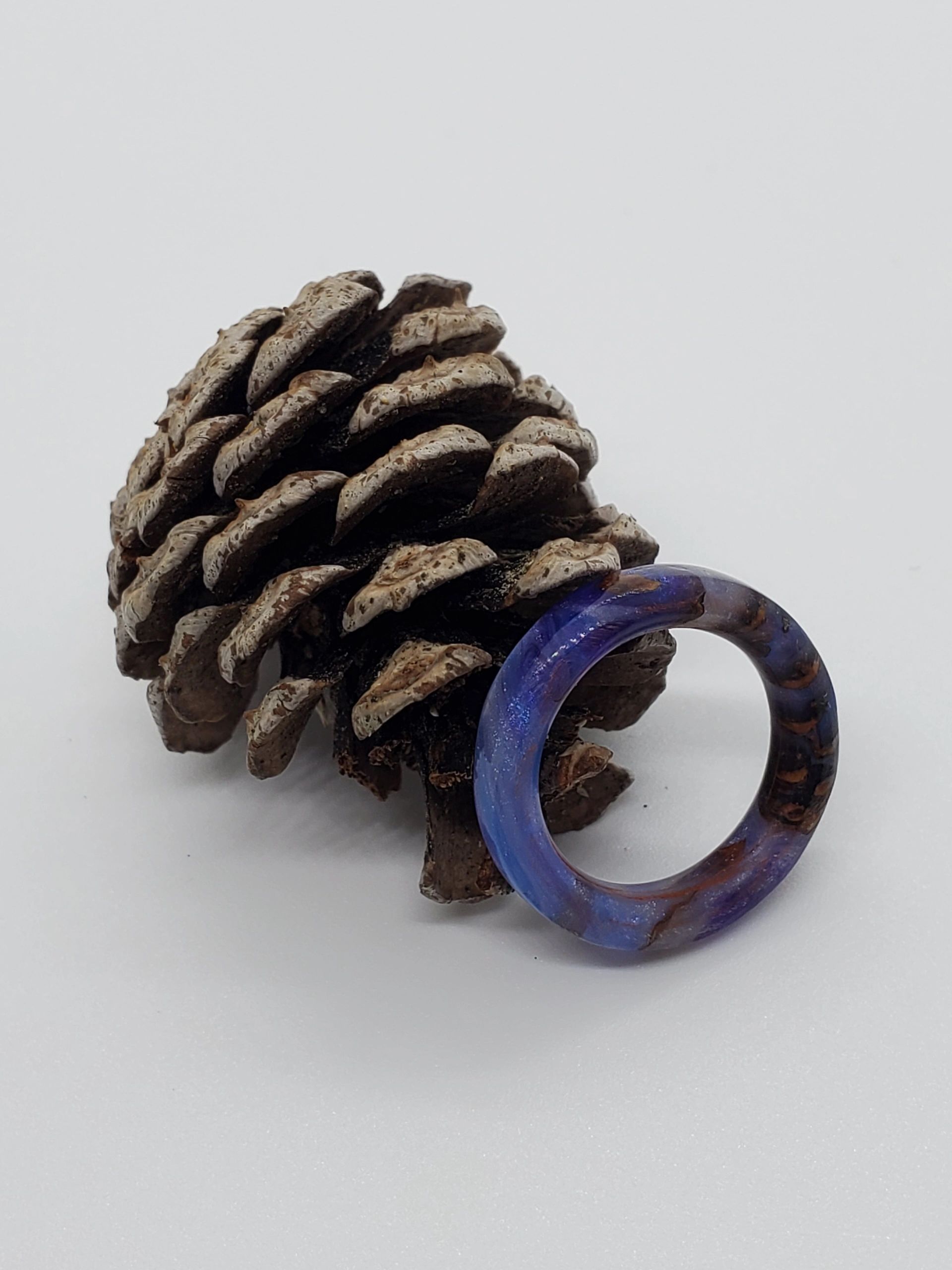 pinecone and resin blue and purple frozen ring
