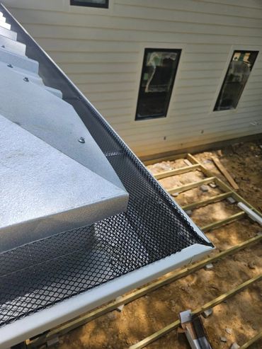 seamless gutters guards residential and commercial