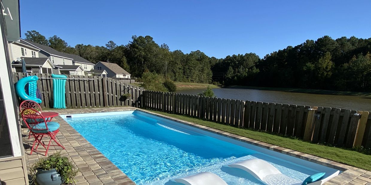 Sun Drenched Pools Install of a San Juan Pools Model Wylela Beach in Sully Blue w/ Pavers