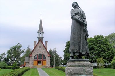 Acadian Church and Evangeline statue. Grand Pre National Historic Site, Nova Scotia, Canada.