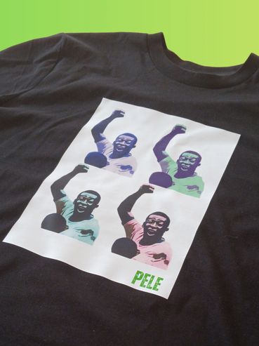 Black T-shirt with pop art images of Pele and his name.
