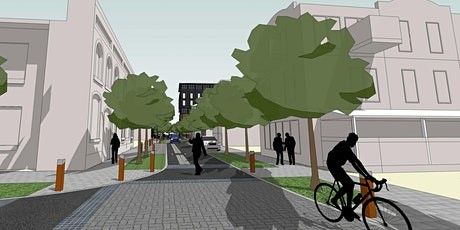 People walking and biking through a city