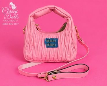 THE LATEST: MIUMIU MINI PASTEL PINK LEATHER CROSSBODY OR SHOULDER BAG. $120.00