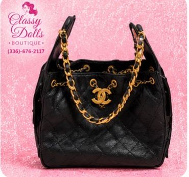 CHANEL SHOULDER BAG. SAYS CHANEL ON THE INSIDE. AND CC ON EACH SIDE. BLACK LEATHER. $200