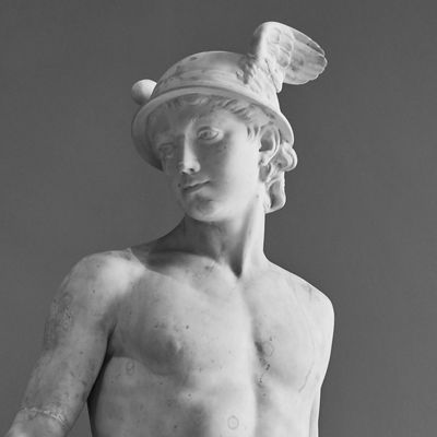 A royalty-free photograph of a marble statue of Hermes, the mercurial Olympian god of medicine.