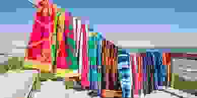 Beach towels, embroidery, customisation, personalisation, logo, names,branding, hosting.