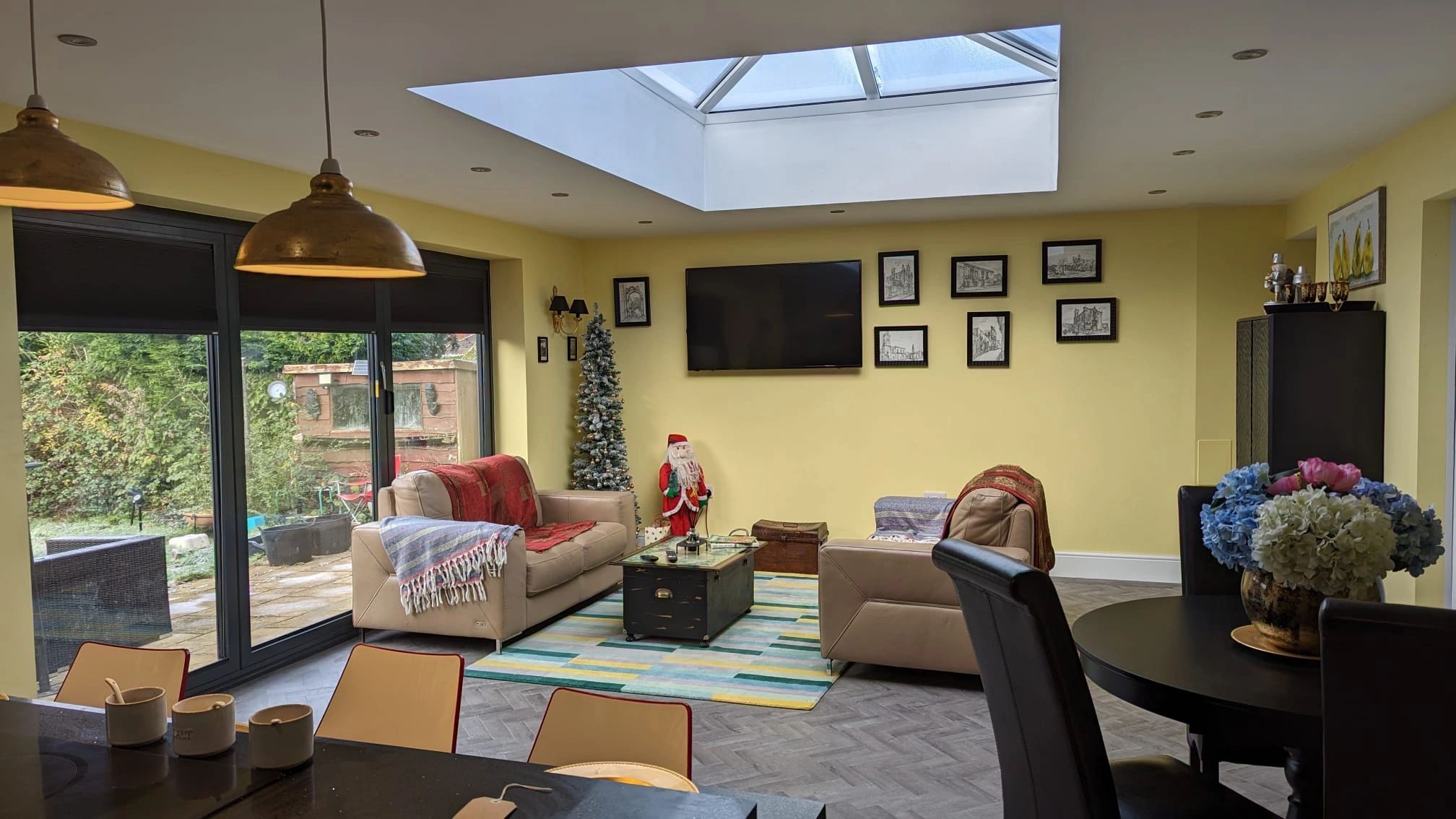 Large single storey extension for extra living space, includes bifold doors and roof lantern.