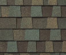 Cedar Falls:  GAF Cedar Falls shingles in deep browns and gold tones, resembling rustic wood.