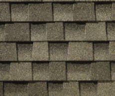 Weathered Wood: Close-up of GAF Weathered Wood shingles in soft browns and grays for a natural look.