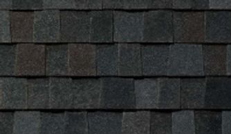 TAMKO Titan XT shingles in Black Walnut, highlighting rich, dark tones.