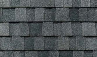 TAMKO Heritage shingles in Virginia Slate, blending classic slate tones with high-definition.