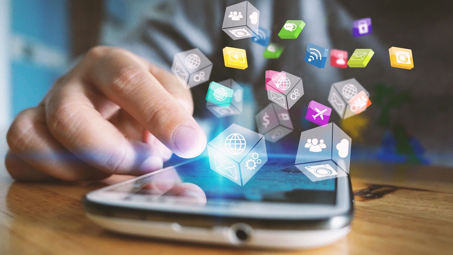 Finger interacting with smartphone showcasing floating digital app icons.