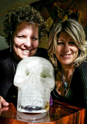 Rebecca Dru & Misti Cooper are with Skully The Crystal Skull and Einstein The Ancient Crystal Skull.