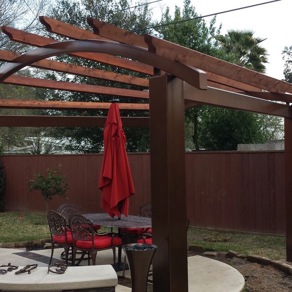 Pergola with Metal Posts, Arched Metal Beam and Cedar Beams