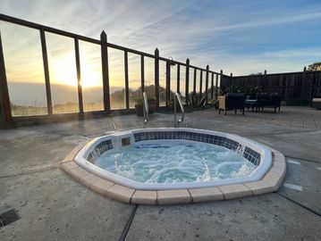 Some rooms include a private hot tub, but all guests are able to enjoy the communal spa. 