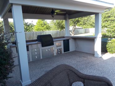 Luxurious cabana with built-in kitchen designed by The Patio Kings